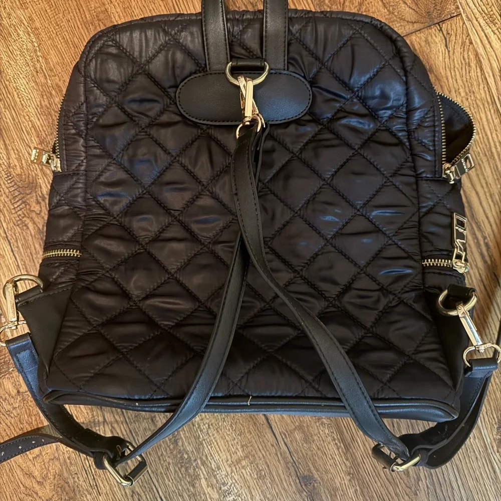 bebe Black Quilted Backpack with Rounded Top and Structured Design - Picture 2 of 3